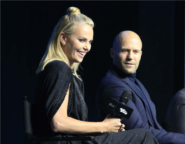 Charlize Theron and Jason Statham come to Beijing to promote The Fate of the Furious, the eighth installment in the car-racing cinematic franchise The Fast and the Furious, which is to be premiered simultaneously in China and the United States. (Photo by Jiang Dong/China Daily) Charlize Theron and Jason Statham come to Beijing to promote The Fate of the Furious, the eighth installment in the car-racing cinematic franchise The Fast and the Furious, which is to be premiered simultaneously in China and the United States. (Photo by Jiang Dong/China Daily)