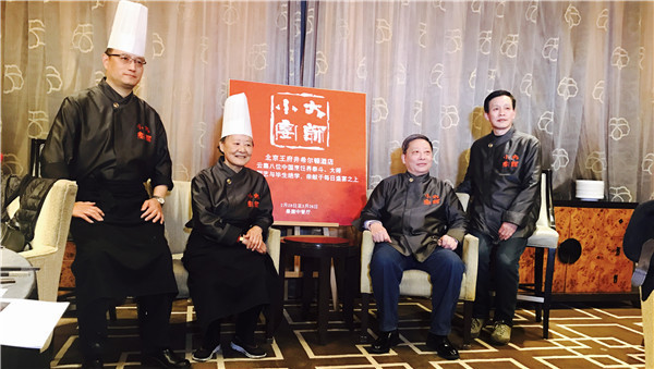 Hu Limei (second from left) poses for a photo at Hilton Beijing Wangfujing, where she cooked three dinners as a guest chef, on March 2, 2017. (Photo by Jiang Wanjuan/chinadaily.com.cn) Hu Limei (second from left) poses for a photo at Hilton Beijing Wangfujing, where she cooked three dinners as a guest chef, on March 2, 2017. (Photo by Jiang Wanjuan/chinadaily.com.cn)