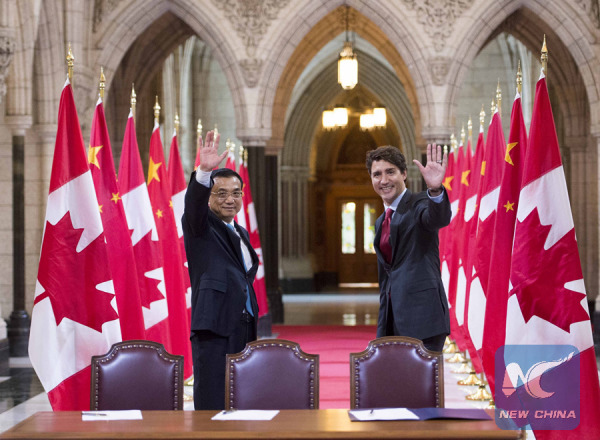 Chinese Premier Li Keqiang (L) and his Canadian counterpart Justin Trudeau attend the signing ceremony of a series of bilateral cooperation documents in Ottawa, Canada, Sept. 22, 2016. (Xinhua/Li Xueren) Chinese Premier Li Keqiang (L) and his Canadian counterpart Justin Trudeau attend the signing ceremony of a series of bilateral cooperation documents in Ottawa, Canada, Sept. 22, 2016. (Xinhua/Li Xueren)