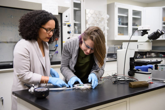 Professor Debbie Senesky, left, works with graduate student Caitlin Chapin on electronics that can resist extreme environments. (Photo/Stanford University) Professor Debbie Senesky, left, works with graduate student Caitlin Chapin on electronics that can resist extreme environments. (Photo/Stanford University)