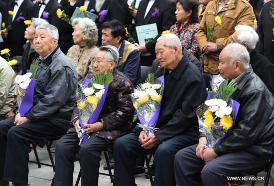 Survivors of the Nanjing Massacre (from right to left, front) Liu Minsheng, Cen Honggui, Wang Xiuying and Pu Yeliang, mourn the victims at the Memorial Hall of the Victims in Nanjing Massacre by Japanese Invaders in Nanjing, capital of east China's Jiangsu Province, April 4, 2017. (Xinhua/Sun Can) Survivors of the Nanjing Massacre (from right to left, front) Liu Minsheng, Cen Honggui, Wang Xiuying and Pu Yeliang, mourn the victims at the Memorial Hall of the Victims in Nanjing Massacre by Japanese Invaders in Nanjing, capital of east China's Jiangsu Province, April 4, 2017. (Xinhua/Sun Can)