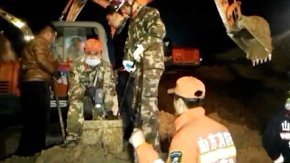 Firefighters toiled for nine hours overnight on Monday to pull a little boy out of a deep, narrow dry well in east China's Shandong Province. (Photo/CGTN) Firefighters toiled for nine hours overnight on Monday to pull a little boy out of a deep, narrow dry well in east China's Shandong Province. (Photo/CGTN)