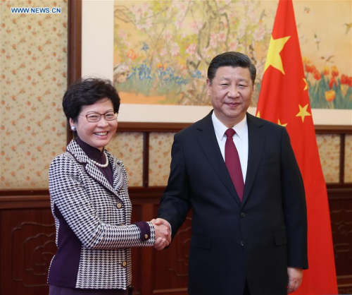 Chinese President Xi Jinping (R) meets with Lam Cheng Yuet-ngor, the newly appointed chief executive of the Hong Kong Special Administrative Region (HKSAR), in Beijing, capital of China, April 11, 2017. (Xinhua/Ju Peng) Chinese President Xi Jinping (R) meets with Lam Cheng Yuet-ngor, the newly appointed chief executive of the Hong Kong Special Administrative Region (HKSAR), in Beijing, capital of China, April 11, 2017. (Xinhua/Ju Peng)