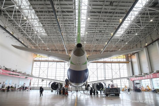 Photo taken on April 11, 2017 shows a C919, the first large passenger aircraft designed and built by China, in a hangar in Shanghai, east China. The C919 passed the last expert assessment on Tuesday, its manufacturer announced. (Xinhua/Ding Ting) Photo taken on April 11, 2017 shows a C919, the first large passenger aircraft designed and built by China, in a hangar in Shanghai, east China. The C919 passed the last expert assessment on Tuesday, its manufacturer announced. (Xinhua/Ding Ting)