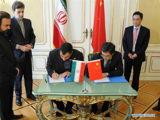 Representatives from China and Iran sign the first commercial contract to redesign Iran's Arak heavy water reactor in Vienna, Austria, on April 23, 2017. (Xinhua/Wang Tengfei) Representatives from China and Iran sign the first commercial contract to redesign Iran's Arak heavy water reactor in Vienna, Austria, on April 23, 2017. (Xinhua/Wang Tengfei)