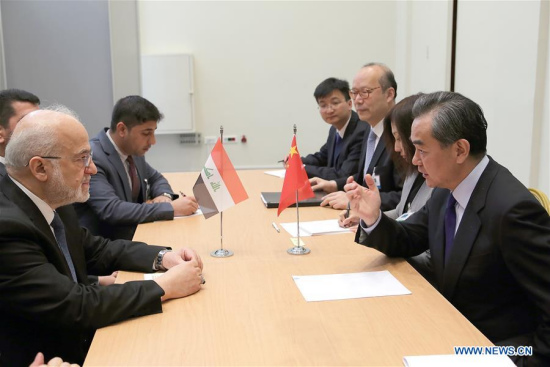 Chinese Foreign Minister Wang Yi (1st R) meets with his Iraqi counterpart Ibrahim al-Jaafari (1st L) on the sidelines of the ongoing Ancient Civilization Forum in Athens, Greece, April 24, 2017. (Xinhua/Marios Lolos)