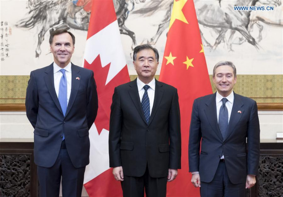 Chinese Vice Premier Wang Yang (C), along with Canadian Finance Minister Morneau (L) and Canadian International Trade Minister Champagne, launches the China-Canada Economic and Financial Strategic Dialogue in Beijing, capital of China, April 25, 2017. (Xinhua/Ding Haitao) Chinese Vice Premier Wang Yang (C), along with Canadian Finance Minister Morneau (L) and Canadian International Trade Minister Champagne, launches the China-Canada Economic and Financial Strategic Dialogue in Beijing, capital of China, April 25, 2017. (Xinhua/Ding Haitao)
