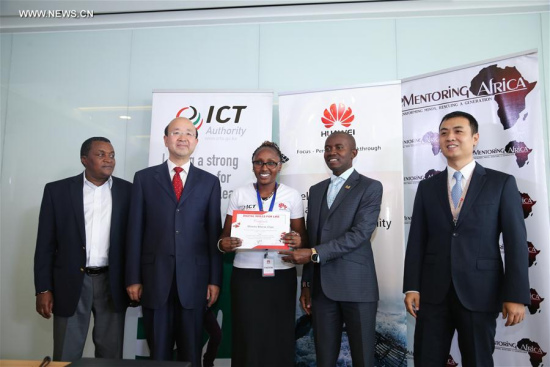 Kenyan Cabinet Secretary for ICT Joe Mucheru (2nd R) and Chinese Ambassador to Kenya Liu Xianfa (2nd L) give a certificate to a trainee at the graduation ceremony of Huawei digital skills development program in Nairobi, capital of Kenya, on April 26, 2017. (Xinhua/Pan Siwei) Kenyan Cabinet Secretary for ICT Joe Mucheru (2nd R) and Chinese Ambassador to Kenya Liu Xianfa (2nd L) give a certificate to a trainee at the graduation ceremony of Huawei digital skills development program in Nairobi, capital of Kenya, on April 26, 2017. (Xinhua/Pan Siwei)