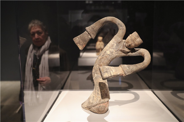 A terracotta figurine is on display at a media preview of the exhibition on March 27. (Photo/Xinhua) A terracotta figurine is on display at a media preview of the exhibition on March 27. (Photo/Xinhua)