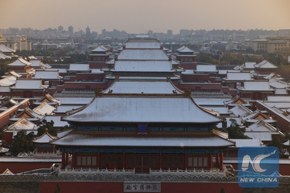 Photo taken on Nov. 23, 2015 shows the snow-covered Palace Museum in Beijing, capital of China. (Xinhua/Zhu Wei)