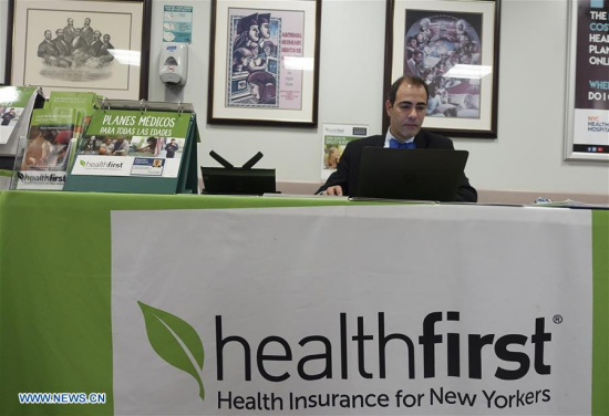 A staff member works at a health insurance counter at a hospital in New York, the United States on May 3, 2017. (Xinhua/Wang Ying) A staff member works at a health insurance counter at a hospital in New York, the United States on May 3, 2017. (Xinhua/Wang Ying)