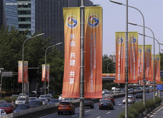 Banners are hung to greet the upcoming Belt and Road Forum for International Cooperation in Beijing, capital of China, May 7, 2017. Beijing will host the Belt and Road Forum for International Cooperation on May 14-15. (Xinhua/Chen Xiaogen) Banners are hung to greet the upcoming Belt and Road Forum for International Cooperation in Beijing, capital of China, May 7, 2017. Beijing will host the Belt and Road Forum for International Cooperation on May 14-15. (Xinhua/Chen Xiaogen)