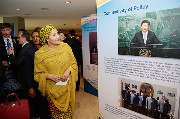 Amina J. Mohammed, deputy secretary-general of the United Nations, examines a piece featuring President Xi Jinping in the photo exhibition Strengthening International Cooperation for Win-Win Development, which opened on Monday in the New York headquarters of the UN. The exhibition opened just days before the start of the Belt and Road Forum for International Cooperation. (LIAO PAN/CHINA NEWS SERVICE) Amina J. Mohammed, deputy secretary-general of the United Nations, examines a piece featuring President Xi Jinping in the photo exhibition Strengthening International Cooperation for Win-Win Development, which opened on Monday in the New York headquarters of the UN. The exhibition opened just days before the start of the Belt and Road Forum for International Cooperation. (LIAO PAN/CHINA NEWS SERVICE)