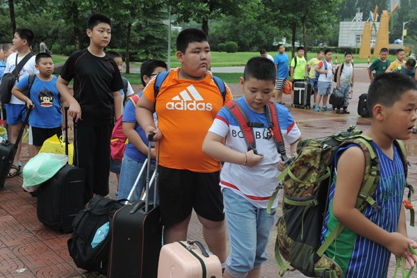 Elementary and middle school students get ready for a 10-day training camp to lose weight in Jinan, Shandong province. About 500 participated. Provided To China Daily Elementary and middle school students get ready for a 10-day training camp to lose weight in Jinan, Shandong province. About 500 participated. Provided To China Daily