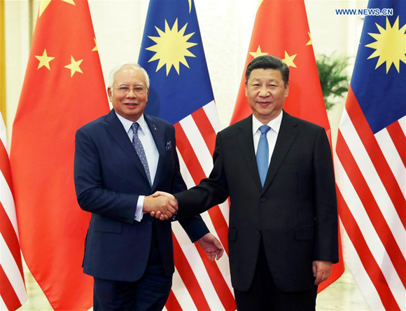 Chinese President Xi Jinping (R) meets with Malaysian Prime Minister Najib Razak, who is here to attend the Belt and Road Forum (BRF) for International Cooperation, in Beijing, capital of China, May 13, 2017. (Xinhua/Ma Zhancheng) Chinese President Xi Jinping (R) meets with Malaysian Prime Minister Najib Razak, who is here to attend the Belt and Road Forum (BRF) for International Cooperation, in Beijing, capital of China, May 13, 2017. (Xinhua/Ma Zhancheng)