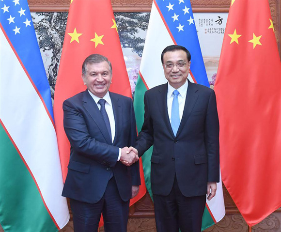 Chinese Premier Li Keqiang (R) meets with Uzbek President Shavkat Mirziyoyev, who is here for a state visit and the upcoming Belt and Road Forum (BRF) for International Cooperation, at the Great Hall of the People in Beijing, capital of China, May 13, 2017. (Xinhua/Zhang Duo) Chinese Premier Li Keqiang (R) meets with Uzbek President Shavkat Mirziyoyev, who is here for a state visit and the upcoming Belt and Road Forum (BRF) for International Cooperation, at the Great Hall of the People in Beijing, capital of China, May 13, 2017. (Xinhua/Zhang Duo)