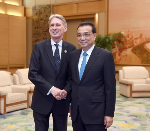 Chinese Premier Li Keqiang (R) meets with British Chancellor of the Exchequer Philip Hammond, who is special envoy of British Prime Minister Theresa May and is here for the Belt and Road Forum (BRF) for International Cooperation, in Beijing, capital of China, May 15, 2017. (Xinhua/Zhang Duo) Chinese Premier Li Keqiang (R) meets with British Chancellor of the Exchequer Philip Hammond, who is special envoy of British Prime Minister Theresa May and is here for the Belt and Road Forum (BRF) for International Cooperation, in Beijing, capital of China, May 15, 2017. (Xinhua/Zhang Duo)