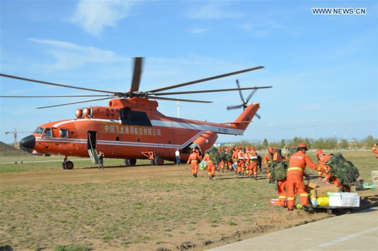 Armed police board an aircraft to fight a forest fire in Hulunbuir City, north China's Inner Mongolia Autonomous Region, May 17, 2017. (Xinhua/Mao Yatuan) Armed police board an aircraft to fight a forest fire in Hulunbuir City, north China's Inner Mongolia Autonomous Region, May 17, 2017. (Xinhua/Mao Yatuan)