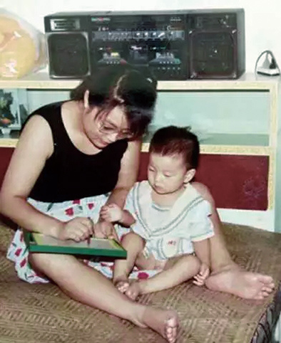 Photo of Zou and her son. (Photo/Xinhua) Photo of Zou and her son. (Photo/Xinhua)