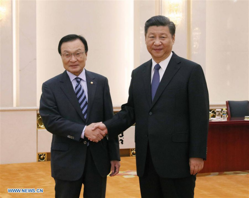 Chinese President Xi Jinping (R) meets with Lee Hae-chan, special envoy of South Korean President Moon Jae-in, at the Great Hall of the People in Beijing, capital of China, May 19, 2017. (Xinhua/Liu Weibing) Chinese President Xi Jinping (R) meets with Lee Hae-chan, special envoy of South Korean President Moon Jae-in, at the Great Hall of the People in Beijing, capital of China, May 19, 2017. (Xinhua/Liu Weibing)