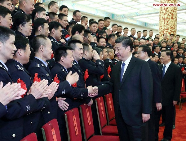 Chinese President Xi Jinping, also general secretary of the Central Committee of the Communist Party of China (CPC), Chinese Premier Li Keqiang and Liu Yunshan, a member of the Standing Committee of the Political Bureau of the CPC Central Committee, meet with heroes and role models from public security departments across the country at the Great Hall of the People in Beijing, capital of China, May 19, 2017. (Xinhua/Ju Peng) Chinese President Xi Jinping, also general secretary of the Central Committee of the Communist Party of China (CPC), Chinese Premier Li Keqiang and Liu Yunshan, a member of the Standing Committee of the Political Bureau of the CPC Central Committee, meet with heroes and role models from public security departments across the country at the Great Hall of the People in Beijing, capital of China, May 19, 2017. (Xinhua/Ju Peng)
