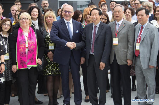 Liu Yuzhu (3rd R), director of the State Administration of Cultural Heritage of China shakes hand with Serbian Minister of Culture and Media Vladan Vukosavljevic (4th R) at the opening of the first China-Central and Eastern European (CEE) Countries Cultural Heritage Forum in Belgrade, Serbia, on May 22, 2017. (Xinhua/Nemanja Cabric) Liu Yuzhu (3rd R), director of the State Administration of Cultural Heritage of China shakes hand with Serbian Minister of Culture and Media Vladan Vukosavljevic (4th R) at the opening of the first China-Central and Eastern European (CEE) Countries Cultural Heritage Forum in Belgrade, Serbia, on May 22, 2017. (Xinhua/Nemanja Cabric)