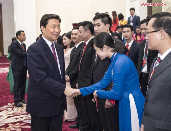 Chinese Vice President Li Yuanchao (L, front) meets with members of a visiting Vietnamese youth delegation headed by Le Quoc Phong, First Secretary of the Secretariat of the Ho Chi Minh Communist Youth Union's Central Committee, in Beijing, capital of China, May 22, 2017. (Xinhua/Li Tao) Chinese Vice President Li Yuanchao (L, front) meets with members of a visiting Vietnamese youth delegation headed by Le Quoc Phong, First Secretary of the Secretariat of the Ho Chi Minh Communist Youth Union's Central Committee, in Beijing, capital of China, May 22, 2017. (Xinhua/Li Tao)