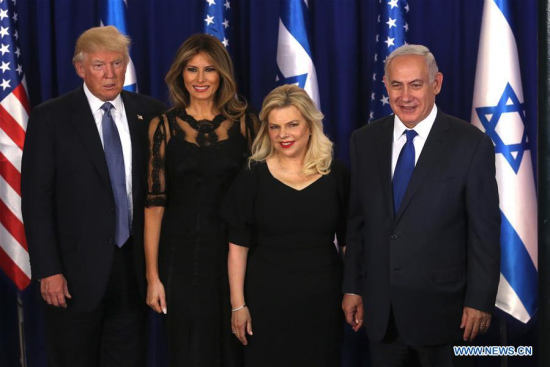 U.S. President Donald Trump (1st, L) and his wife Melania Trump (2nd L) pose for photos with Israeli Prime Minister Benjamin Netanyahu (1st, R) and his wife Sara Netanyahu in Jerusalem, on May 22, 2017. (Xinhua/JINI/POOL/Marc Israel Sellem) U.S. President Donald Trump (1st, L) and his wife Melania Trump (2nd L) pose for photos with Israeli Prime Minister Benjamin Netanyahu (1st, R) and his wife Sara Netanyahu in Jerusalem, on May 22, 2017. (Xinhua/JINI/POOL/Marc Israel Sellem)