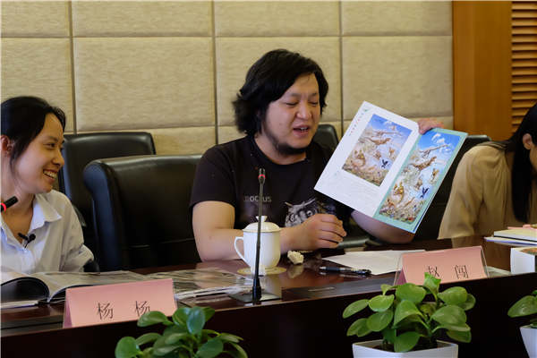 Zhao Chuang, an artist in Beijing, has collaborated with China Post on two sheets of stamps, Chinese Dinosaurs, which were issued on Friday. (Photo provided to China Daily) Zhao Chuang, an artist in Beijing, has collaborated with China Post on two sheets of stamps, Chinese Dinosaurs, which were issued on Friday. (Photo provided to China Daily)