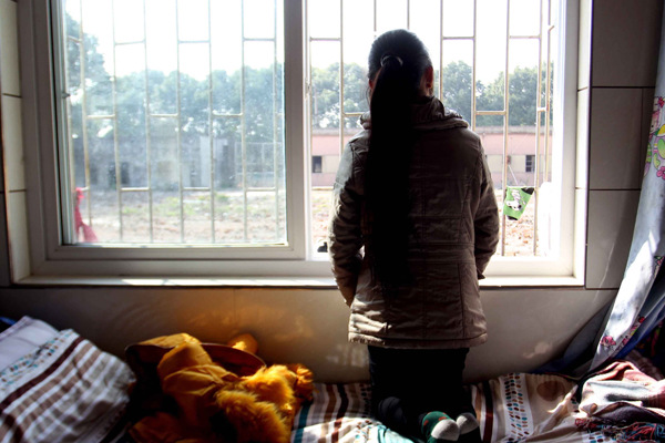 A Vietnamese woman waits to be repatriated at a temporary hostel in Anqing, Anhui province. (Photo by Xu Pu/China Daily) A Vietnamese woman waits to be repatriated at a temporary hostel in Anqing, Anhui province. (Photo by Xu Pu/China Daily)