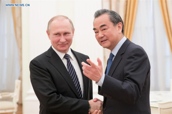 Russian President Vladimir Putin (L) meets with visiting Chinese Foreign Minister Wang Yi in the Kremlin, Moscow, Russia on May 25, 2017. (Xinhua/Wu Zhuang) Russian President Vladimir Putin (L) meets with visiting Chinese Foreign Minister Wang Yi in the Kremlin, Moscow, Russia on May 25, 2017. (Xinhua/Wu Zhuang)