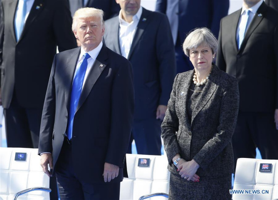 U.S. President Donald Trump (L) and British Prime Minister Theresa May (R) attend the handover ceremony of the new NATO headquarters during a one-day NATO Summit, in Brussels, Belgium, May 25, 2017. (Xinhua/Ye Pingfan) U.S. President Donald Trump (L) and British Prime Minister Theresa May (R) attend the handover ceremony of the new NATO headquarters during a one-day NATO Summit, in Brussels, Belgium, May 25, 2017. (Xinhua/Ye Pingfan)