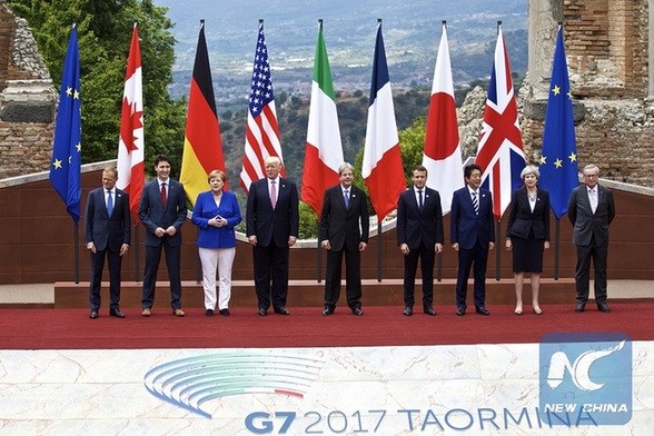 Leaders of the Group of Seven (G7) industrialized nations, plus the EU, pose for a photo in the ancient Greek theatre of Taormina, Italy, on May 26, 2017. (Xinhua/Jin Yu) Leaders of the Group of Seven (G7) industrialized nations, plus the EU, pose for a photo in the ancient Greek theatre of Taormina, Italy, on May 26, 2017. (Xinhua/Jin Yu)