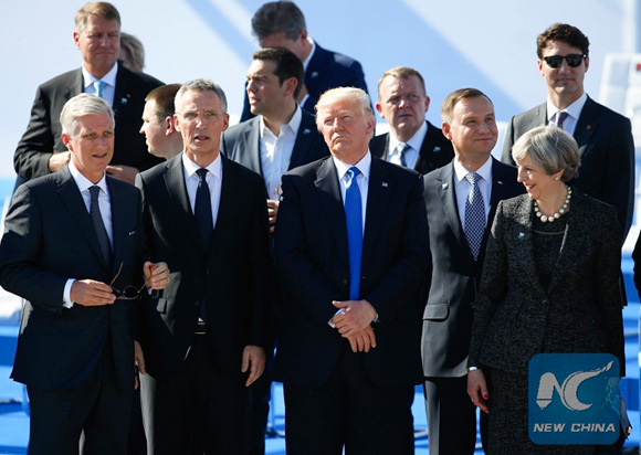 King Philippe of Belgium, NATO Secretary General Jens Stoltenberg, U.S. President Donald Trump, British Prime Minister Theresa May (from L to R, front) and other NATO member states leaders watch air show at the handover ceremony of the new NATO headquarters during a one-day NATO Summit, in Brussels, Belgium, May 25, 2017. (Xinhua/Ye Pingfan) King Philippe of Belgium, NATO Secretary General Jens Stoltenberg, U.S. President Donald Trump, British Prime Minister Theresa May (from L to R, front) and other NATO member states leaders watch air show at the handover ceremony of the new NATO headquarters during a one-day NATO Summit, in Brussels, Belgium, May 25, 2017. (Xinhua/Ye Pingfan)