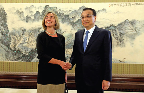 Premier Li Keqiang greets Federica Mogherini, the European Union's high representative for foreign affairs and security policy, before their meeting at the Zhongnanhai leadership compound in Beijing on April 18. Feng Yongbin / China Daily Premier Li Keqiang greets Federica Mogherini, the European Union's high representative for foreign affairs and security policy, before their meeting at the Zhongnanhai leadership compound in Beijing on April 18. Feng Yongbin / China Daily