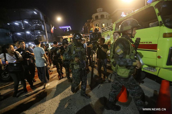 Security forces secure the surroundings of Resorts World Manila after an attack in Pasay City, the Philippines, on June 2, 2017. (Xinhua/Stringer) Security forces secure the surroundings of Resorts World Manila after an attack in Pasay City, the Philippines, on June 2, 2017. (Xinhua/Stringer)