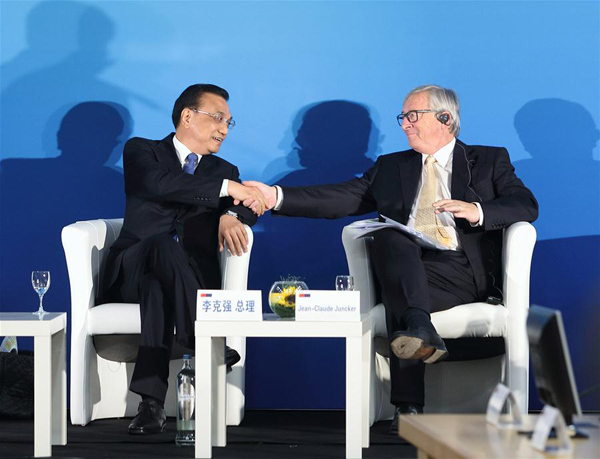 Chinese Premier Li Keqiang (L) and European Commission President Jean-Claude Juncker attend the 12th EU-China Business Summit in Brussels, Belgium, June 2, 2017. (Xinhua/Wang Ye) Chinese Premier Li Keqiang (L) and European Commission President Jean-Claude Juncker attend the 12th EU-China Business Summit in Brussels, Belgium, June 2, 2017. (Xinhua/Wang Ye)