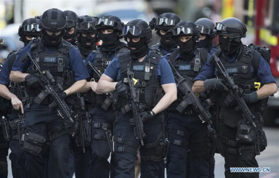 Armed police officers patrol near London Bridge after the terror attack took place on Saturday night in London, Britain on June 4, 2017. (Xinhua/UK OUT) Armed police officers patrol near London Bridge after the terror attack took place on Saturday night in London, Britain on June 4, 2017. (Xinhua/UK OUT)