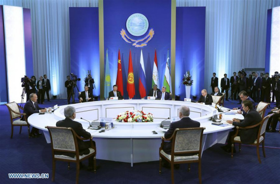 Chinese President Xi Jinping attends a small-range meeting during the 17th meeting of Council of Heads of State of the Shanghai Cooperation Organization (SCO) in Astana, Kazakhstan, June 9, 2017. (Xinhua/Pang Xinglei)