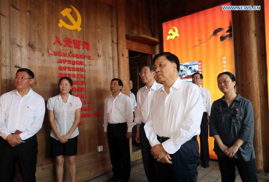 Liu Yunshan (R front), a member of the Standing Committee of the Political Bureau of the Communist Party of China (CPC) Central Committee, visits Shizhen Village to learn more about Liao Junbo, a late official who had served in Fujian, in Zhenghe County, southeast China's Fujian Province, June 9, 2017. Liu Yunshan (R front), a member of the Standing Committee of the Political Bureau of the Communist Party of China (CPC) Central Committee, visits Shizhen Village to learn more about Liao Junbo, a late official who had served in Fujian, in Zhenghe County, southeast China's Fujian Province, June 9, 2017.