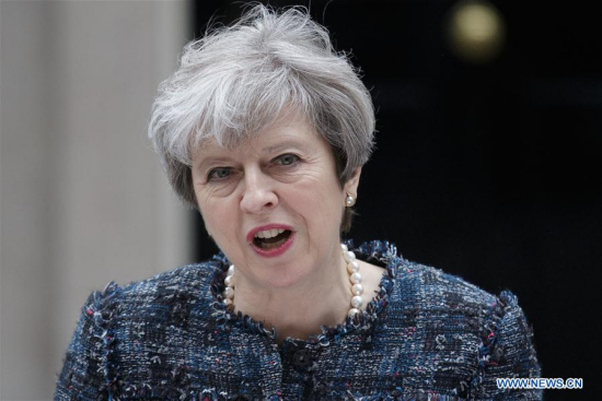 British Prime Minister Theresa May makes a statement at 10 Downing Street after returning from Buckingham Palace where she met Britain's Queen Elizabeth II to ask permission for the dissolution of Parliament, in London, Britain on May 3, 2017. (Xinhua/Tim Ireland) British Prime Minister Theresa May makes a statement at 10 Downing Street after returning from Buckingham Palace where she met Britain's Queen Elizabeth II to ask permission for the dissolution of Parliament, in London, Britain on May 3, 2017. (Xinhua/Tim Ireland)