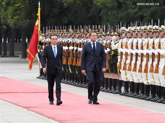 Chinese Premier Li Keqiang (L) holds a welcome ceremony for Luxembourg Prime Minister Xavier Bettel before their talks in Beijing, capital of China, June 12, 2017. (Xinhua/Zhang Duo) Chinese Premier Li Keqiang (L) holds a welcome ceremony for Luxembourg Prime Minister Xavier Bettel before their talks in Beijing, capital of China, June 12, 2017. (Xinhua/Zhang Duo)