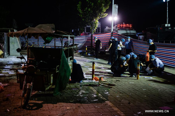 Forensic experts work at the site of the explosion near a kindergarten in Fengxian County in east China's Jiangsu Province, June 16, 2017. (Xinhua/Li Xiang) Forensic experts work at the site of the explosion near a kindergarten in Fengxian County in east China's Jiangsu Province, June 16, 2017. (Xinhua/Li Xiang)