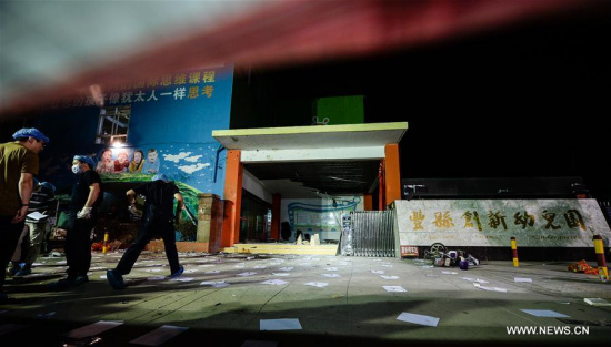 Forensic experts work at the site of the explosion near a kindergarten in Fengxian County in east China's Jiangsu Province, June 16, 2017. (Xinhua/Li Xiang) Forensic experts work at the site of the explosion near a kindergarten in Fengxian County in east China's Jiangsu Province, June 16, 2017. (Xinhua/Li Xiang)