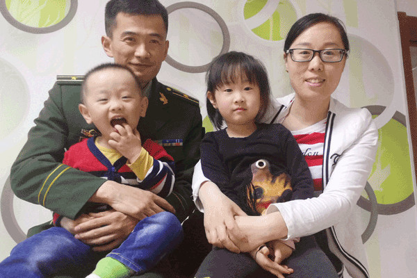 Zhao Lujie and Gu Suli with their two children at home in Beiji village, Heilongjiang province. Photo Provided To China Daily Zhao Lujie and Gu Suli with their two children at home in Beiji village, Heilongjiang province. Photo Provided To China Daily