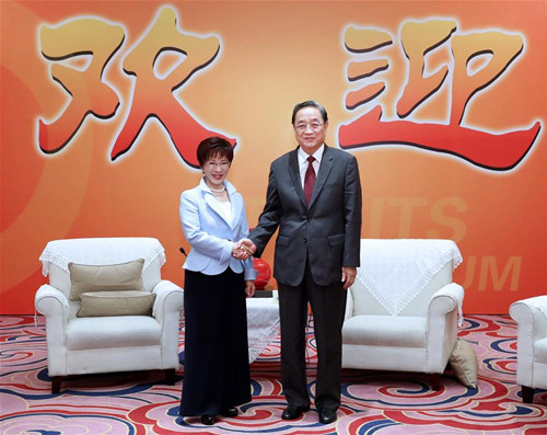 Yu Zhengsheng (R), chairman of the National Committee of the Chinese People's Political Consultative Conference, shakes hands with Hung Hsiu-chu, chairperson of the Taiwan-based Kuomintang (KMT) party at the ongoing 9th Straits Forum in Xiamen of southeast China's Fujian Province, June 17, 2017. (Xinhua/Ma Zhancheng) Yu Zhengsheng (R), chairman of the National Committee of the Chinese People's Political Consultative Conference, shakes hands with Hung Hsiu-chu, chairperson of the Taiwan-based Kuomintang (KMT) party at the ongoing 9th Straits Forum in Xiamen of southeast China's Fujian Province, June 17, 2017. (Xinhua/Ma Zhancheng)