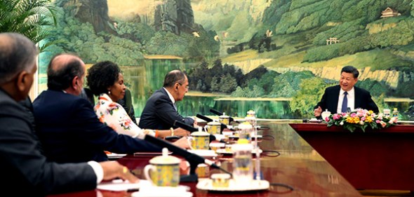 President Xi Jinping meets with foreign ministers from Brazil, Russia, India and South Africa, the other BRICS countries, in Beijing. [WU ZHIYI/CHINA DAILY]