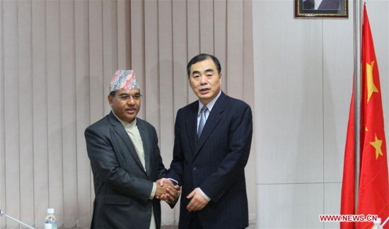 Chinese Assistant Foreign Minister Kong Xuanyou (R) shakes hands with Nepal's Foreign Secretary Shanker DAS Bairagi before the 11th meeting of Nepal-China Joint Consultation Mechanism held at the office of Foreign Ministry at Singhadurbar in Kathmandu, Nepal, June 20, 2017. (Xinhua/Sunil Sharma) Chinese Assistant Foreign Minister Kong Xuanyou (R) shakes hands with Nepal's Foreign Secretary Shanker DAS Bairagi before the 11th meeting of Nepal-China Joint Consultation Mechanism held at the office of Foreign Ministry at Singhadurbar in Kathmandu, Nepal, June 20, 2017. (Xinhua/Sunil Sharma)
