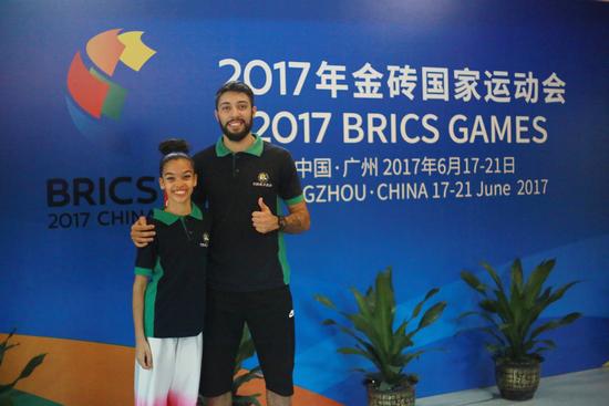 The Brazilian brother and sister pose for a photo. The Brazilian brother and sister pose for a photo.
