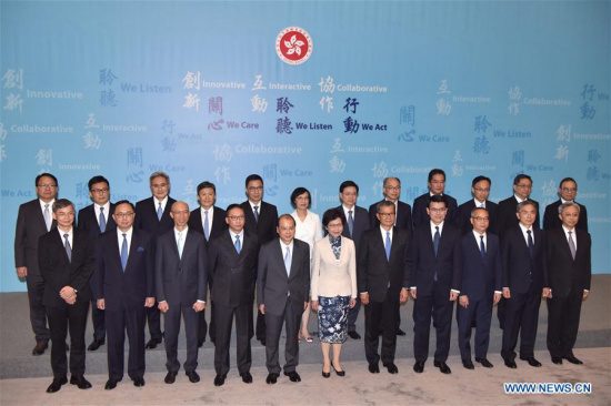 The Hong Kong Special Administrative Region (HKSAR)'s fifth-term chief executive Lam Cheng Yuet-ngor (C front) and principal officials of the fifth term government of the HKSAR pose for group pictures during a press conference in south China's Hong Kong, June 21, 2017. (Xinhua/Wang Xi) The Hong Kong Special Administrative Region (HKSAR)'s fifth-term chief executive Lam Cheng Yuet-ngor (C front) and principal officials of the fifth term government of the HKSAR pose for group pictures during a press conference in south China's Hong Kong, June 21, 2017. (Xinhua/Wang Xi)